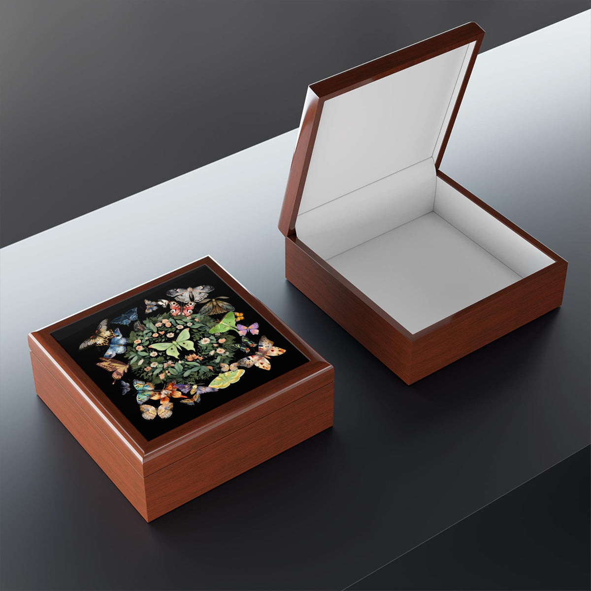 Brown luna moth jewelry box shown closed beside an open matching box with an empty pale-lined interior.