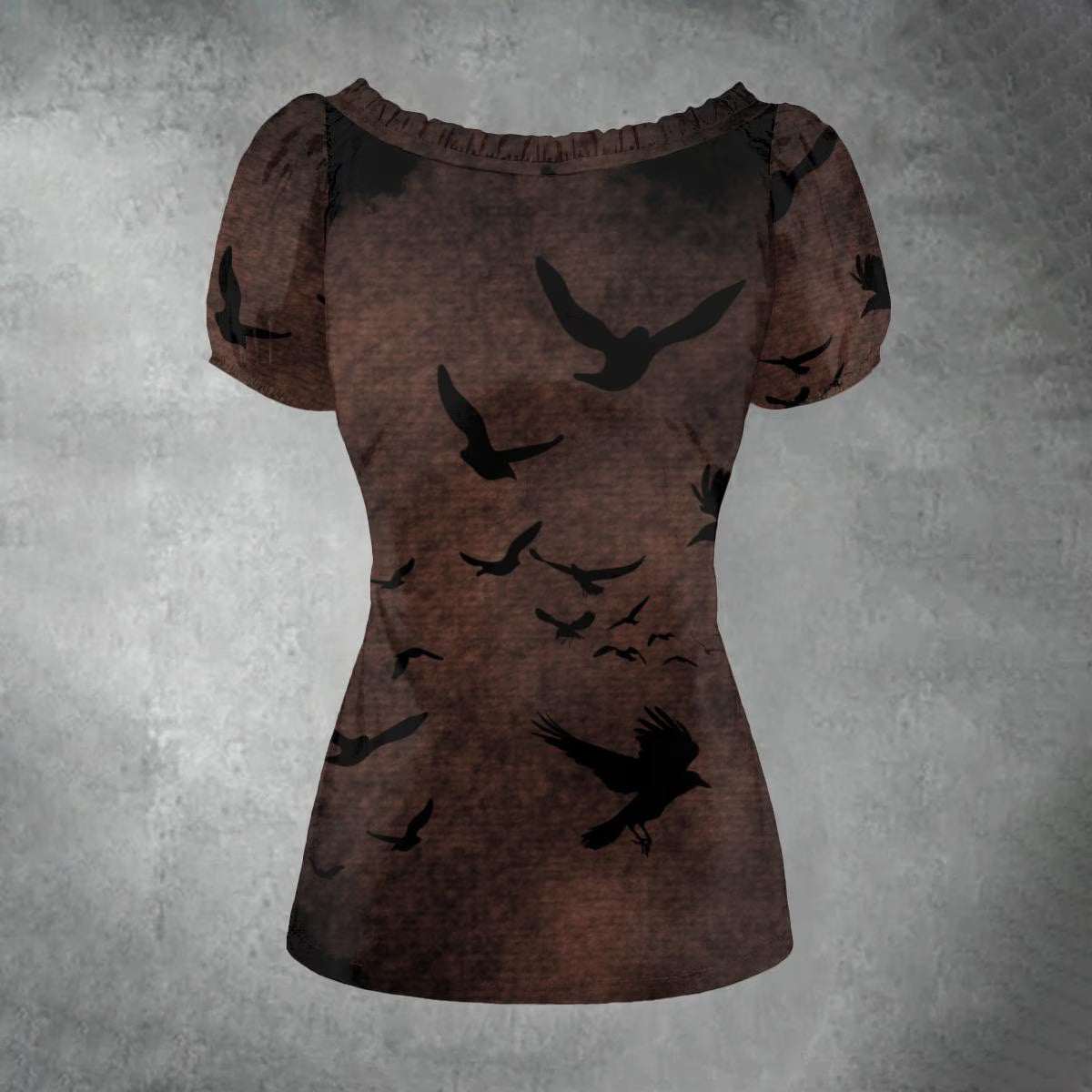 A short-sleeve ruffled-neck top with an all-over brown and black bird print, displayed against a textured gray background.
