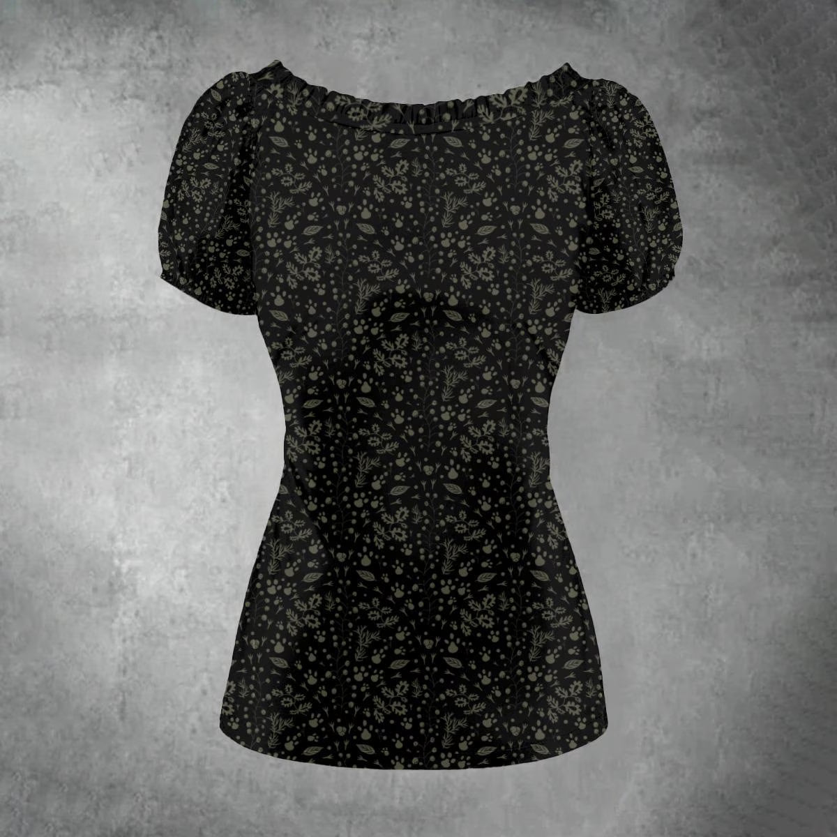 Black floral patterned top on a textured gray background